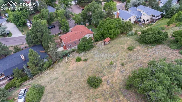 a view of a balcony with wooden floor