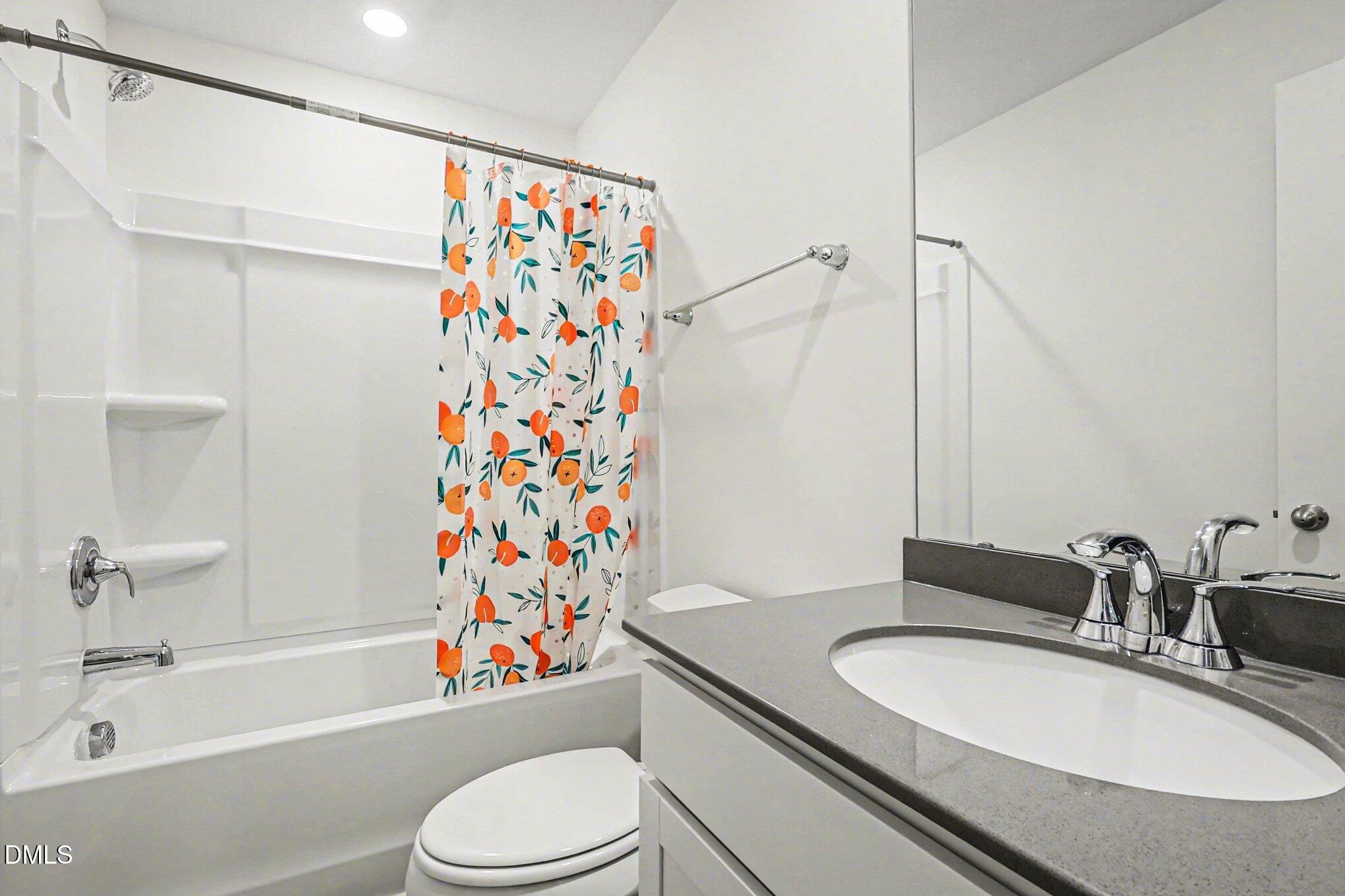 2732 Princess Tree Drive Raleigh, NC 27616 - Photo 19 of 32 a bathroom with a sink toilet and shower