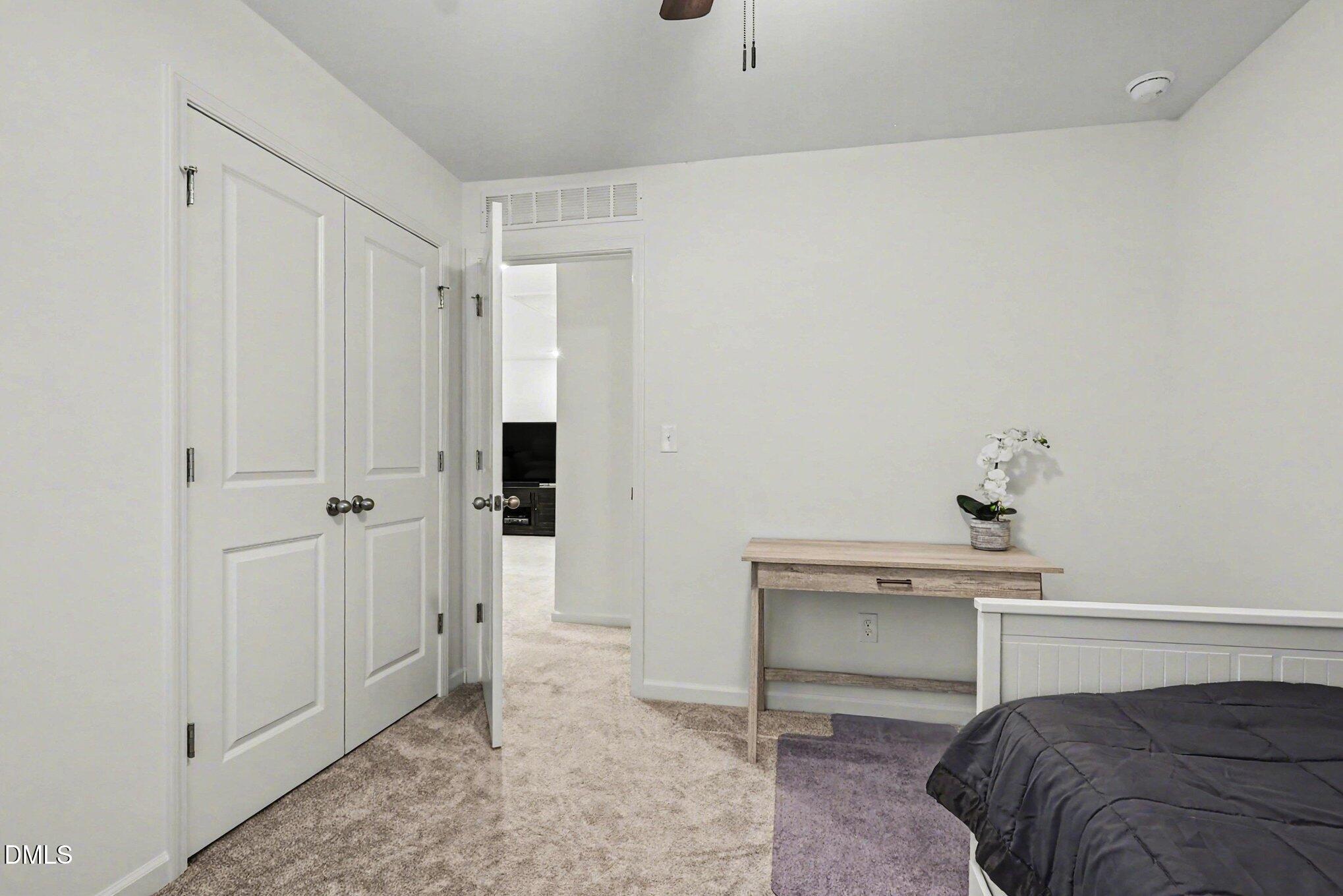 2732 Princess Tree Drive Raleigh, NC 27616 - Photo 21 of 32 a view of a bedroom with a hardwood and hallway