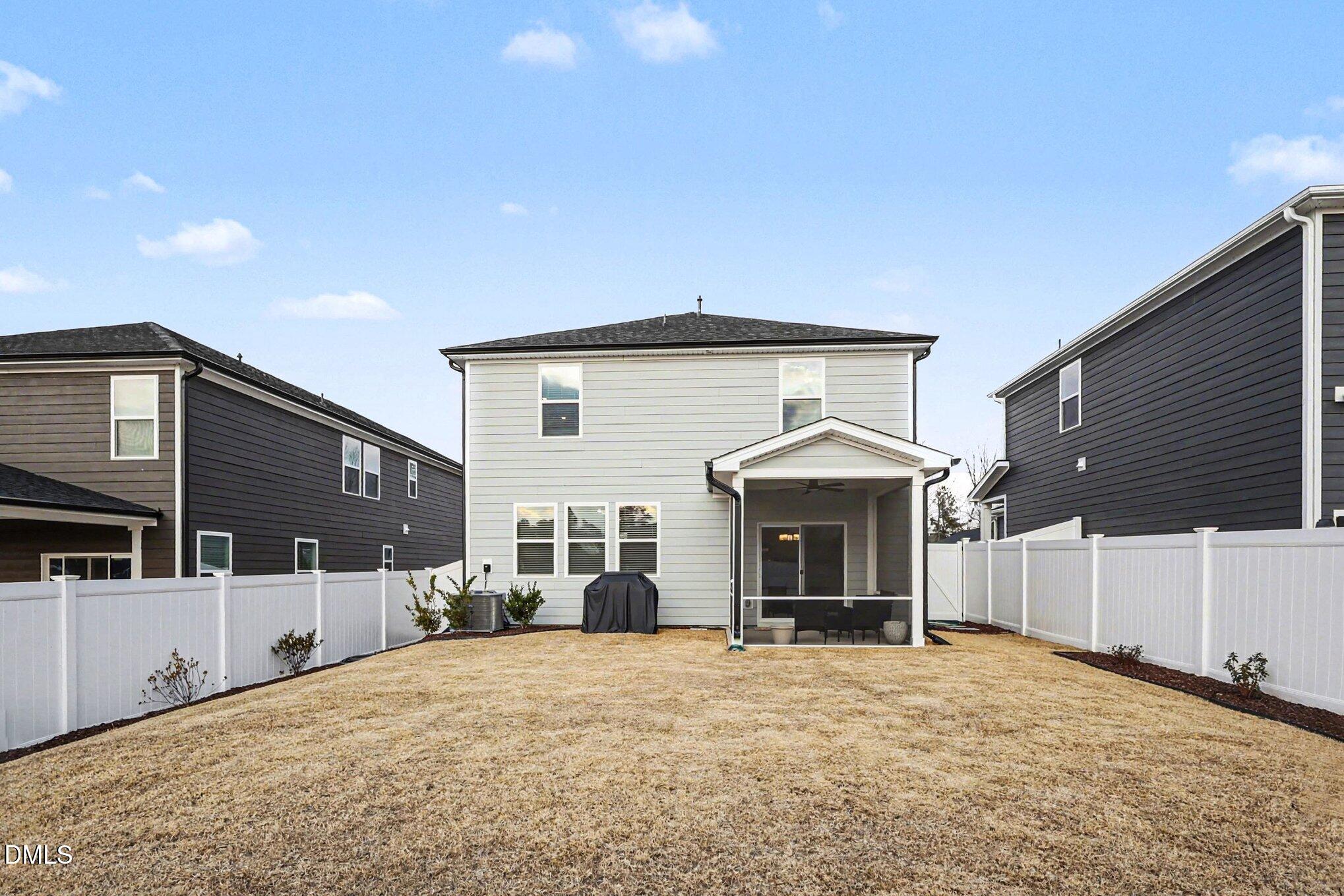 2732 Princess Tree Drive Raleigh, NC 27616 - Photo 25 of 32 a front view of a house with a yard and garage