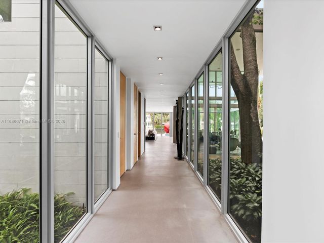 a dining room with a table and chairs