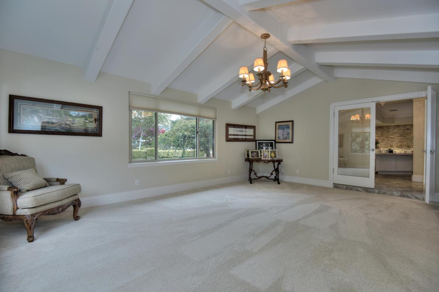 5300 Hecker Pass Road Gilroy, CA 95020 - Photo 23 of 46 a view of livingroom with furniture chandelier and a window