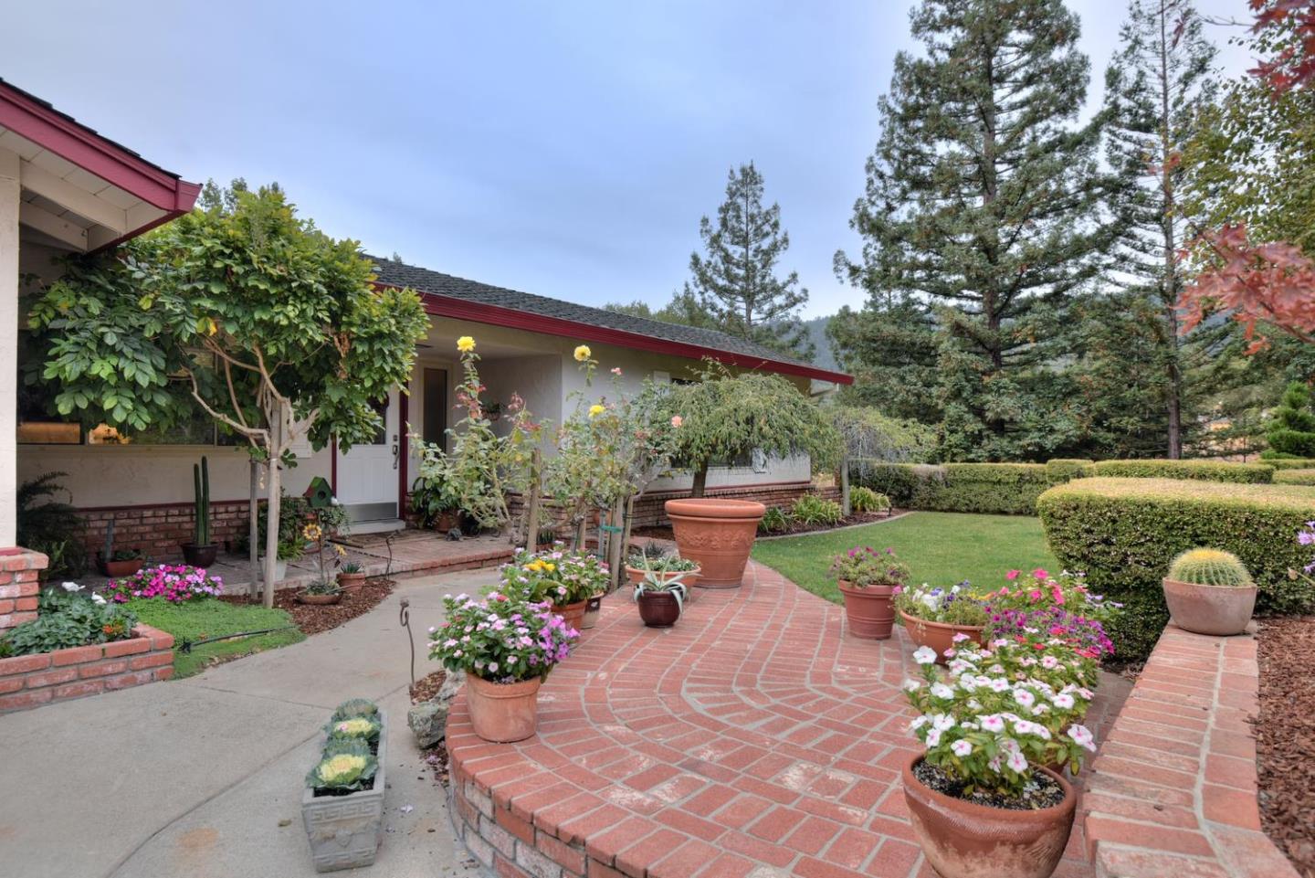 5300 Hecker Pass Road Gilroy, CA 95020 - Photo 45 of 46 a view of a table and chairs in patio with a fire pit