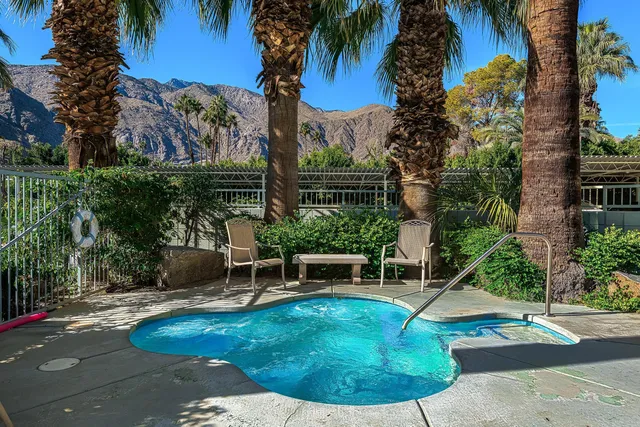 a view of a backyard with a patio