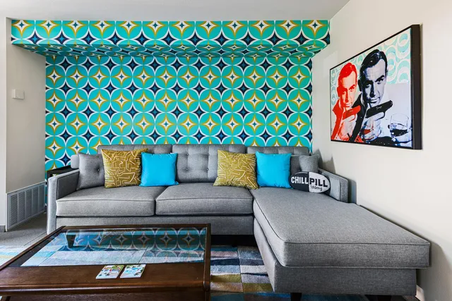 a living room with furniture and a rug