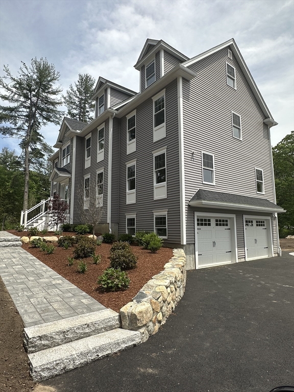 56 Dudley Road Billerica, MA 01821 - Photo 2 of 29 a front view of a house with entertaining space