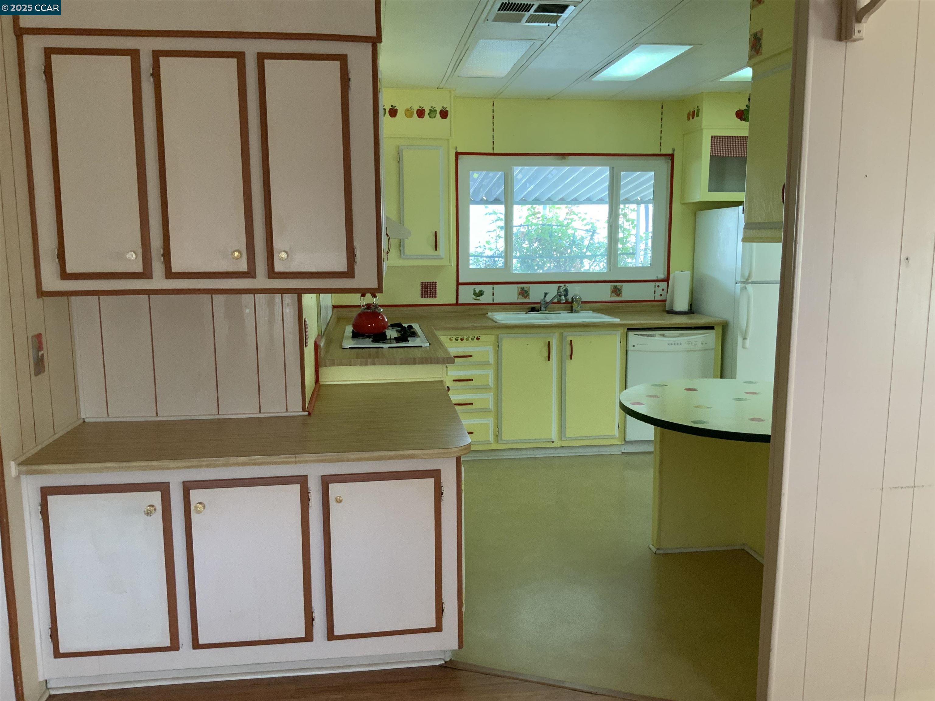 202 Queens Way Pittsburg, CA 94565 - Photo 14 of 29 a bathroom with a sink and a mirror
