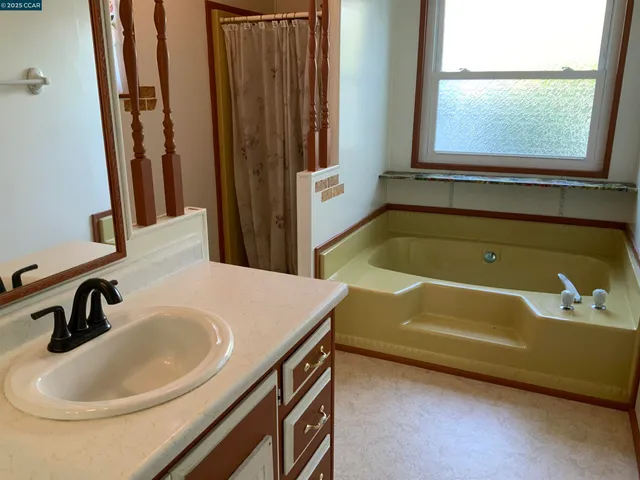 a bathroom with a sink and a bathtub