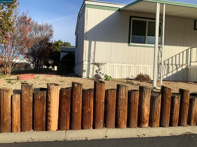 a view of a wooden fence