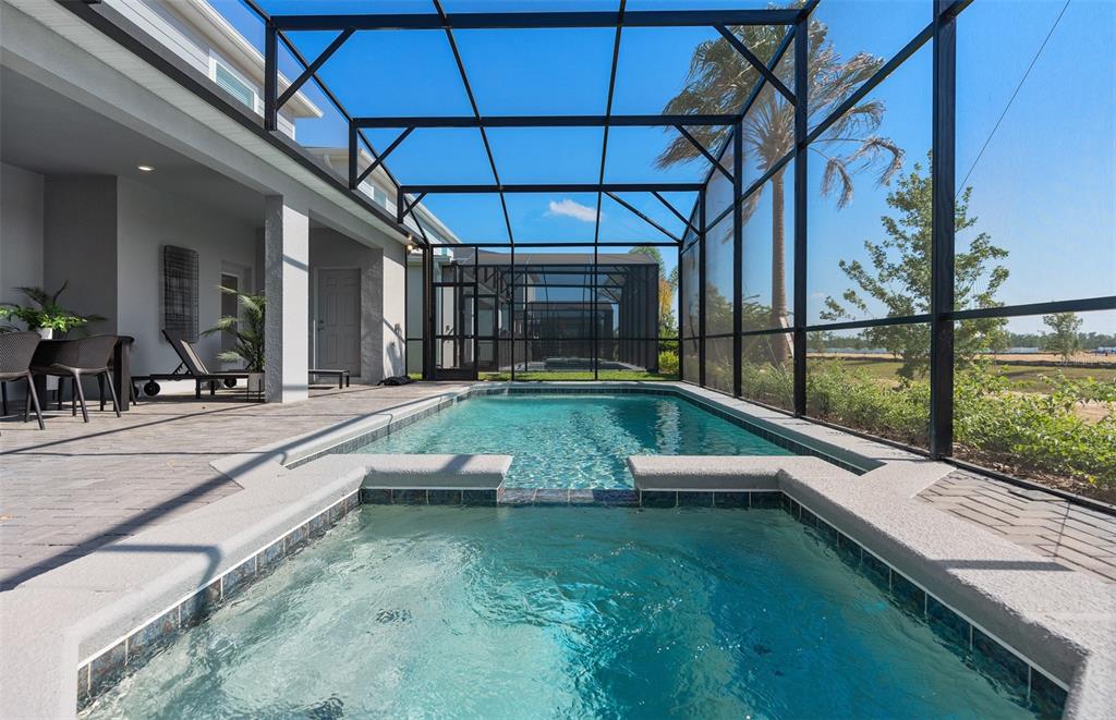 15918 Calm Key Loop Clermont, FL 34714 - Photo 21 of 57 a view of swimming pool with outdoor seating