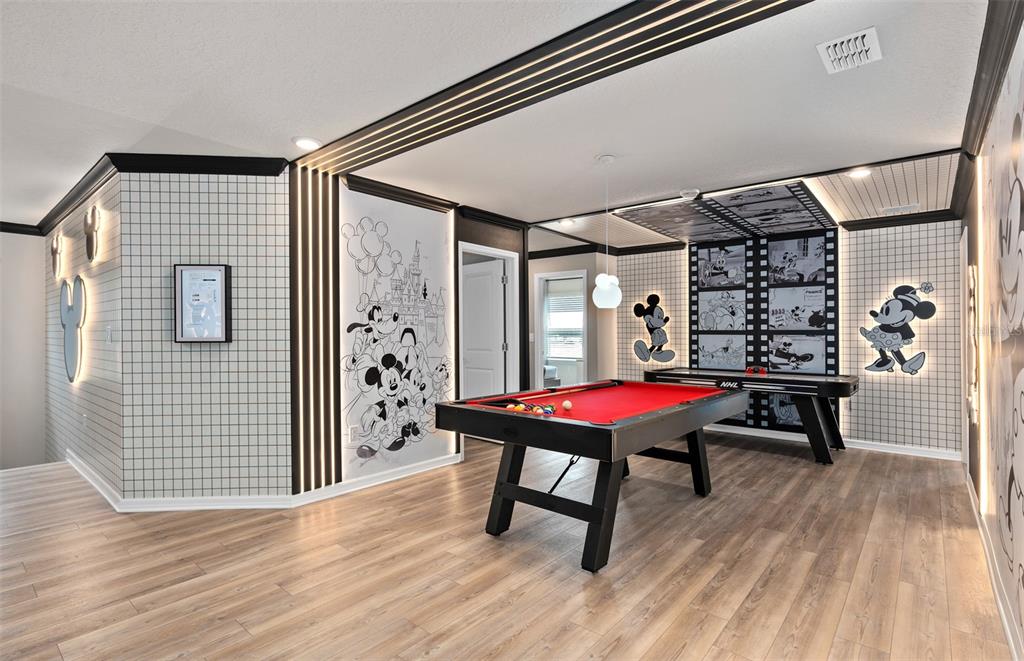 15918 Calm Key Loop Clermont, FL 34714 - Photo 33 of 57 a balcony with furniture and wooden floor