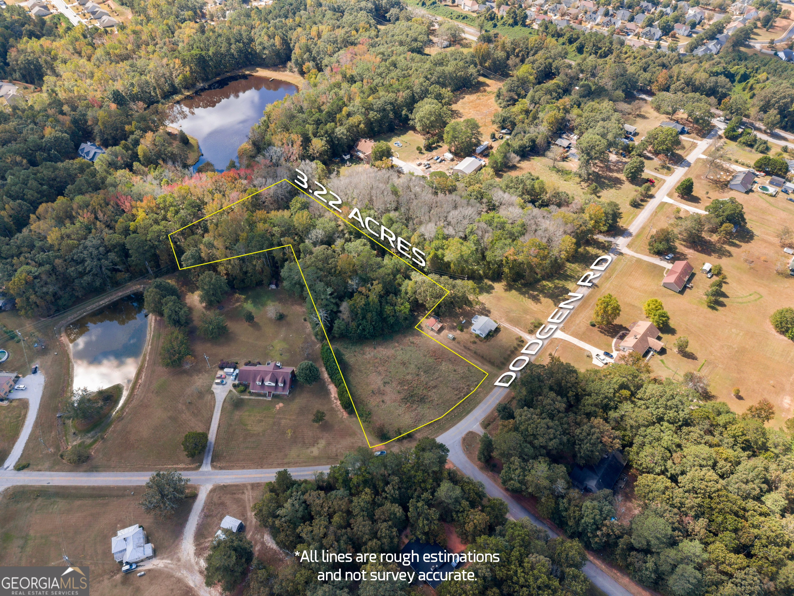 0 Dodgen Road Hampton, GA 30228 - Photo 2 of 16 an aerial view of residential houses with outdoor space