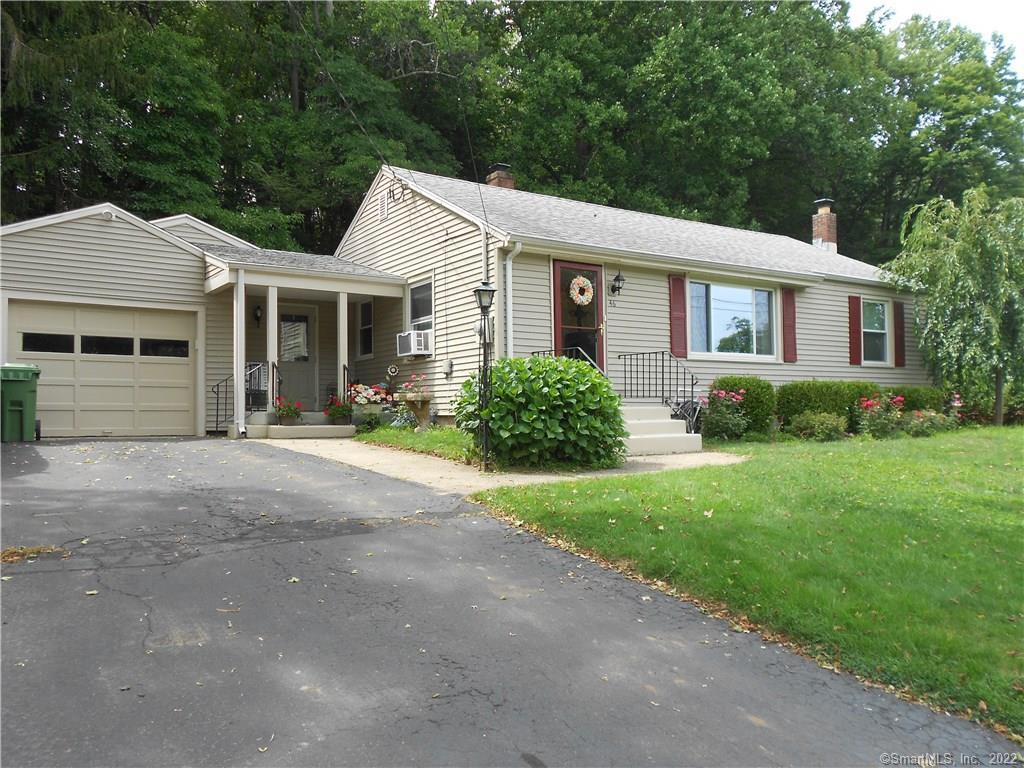 46 Forest Road Wallingford, CT 06492 - Photo 1 of 1 a view of a yard in front of a house