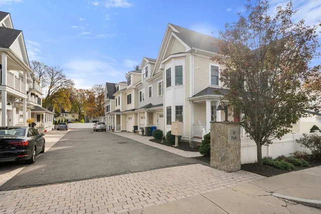 a view of a street in front of a building