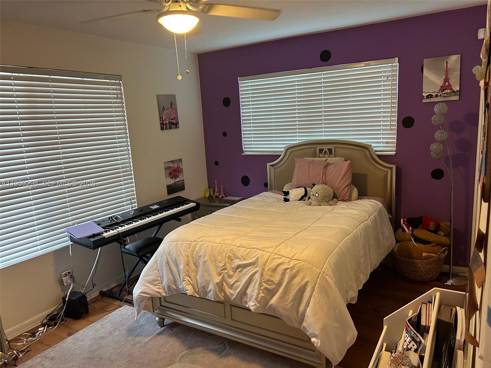 262 Southwest 54th Avenue Plantation, FL 33317 - Photo 9 of 16 a bedroom with a bed and a window