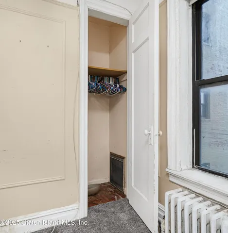 a picture of a book and a white wall