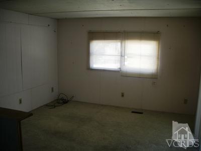 4381 Cochran Street, Unit 6 Simi Valley, CA 93063 - Photo 6 of 8 a view of a window in an empty room