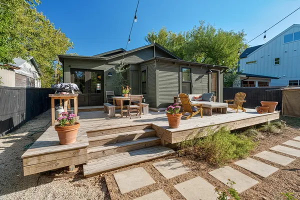 a view of a backyard with a patio