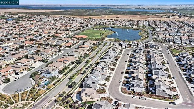 wooden floor with a water view