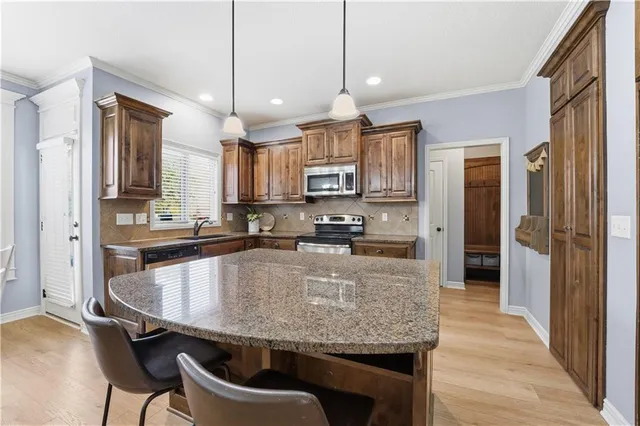 $539,900 | 3112 Southeast Brookside Court, Lee's Summit, MO 64063