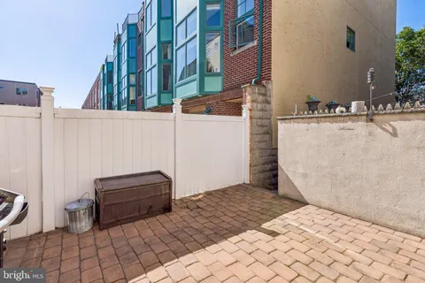 a view of a terrace with chairs