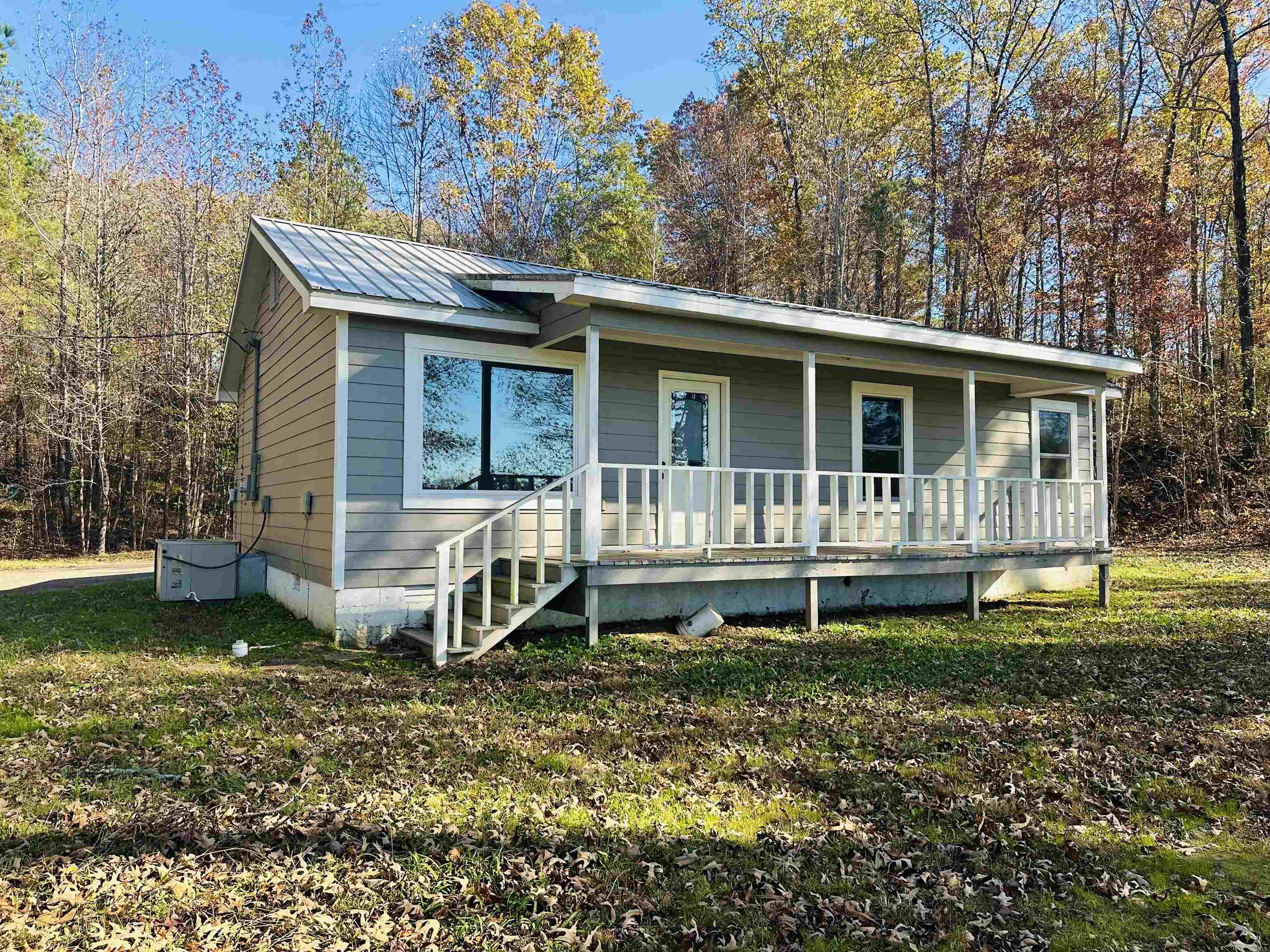 623 Bethesda-Purdy Road Selmer, TN 38375 - Photo 1 of 19 View of front of house with covered porch and a front yard