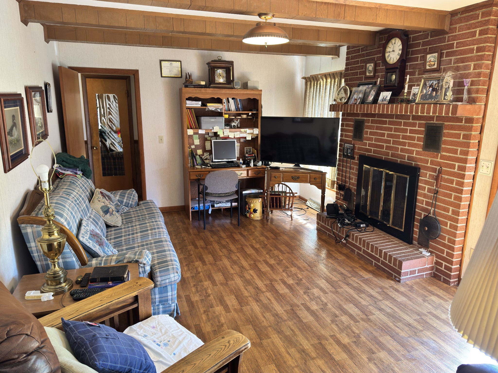 205 Mary Sharp Drive Decherd, TN 37324 - Photo 4 of 18 a living room with furniture and a fireplace