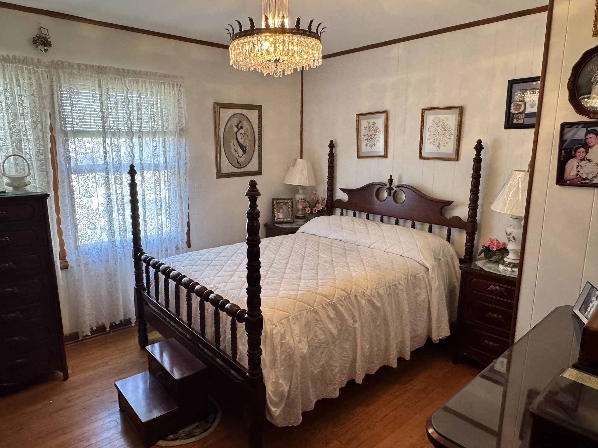 205 Mary Sharp Drive Decherd, TN 37324 - Photo 8 of 18 a bed sitting in a bedroom next to a window