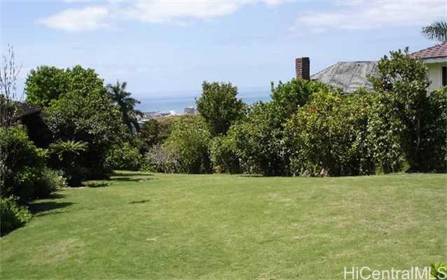 3101 Pacific Heights Road Honolulu, HI 96813 - Photo 1 of 1 a view of a grassy field with trees in the background