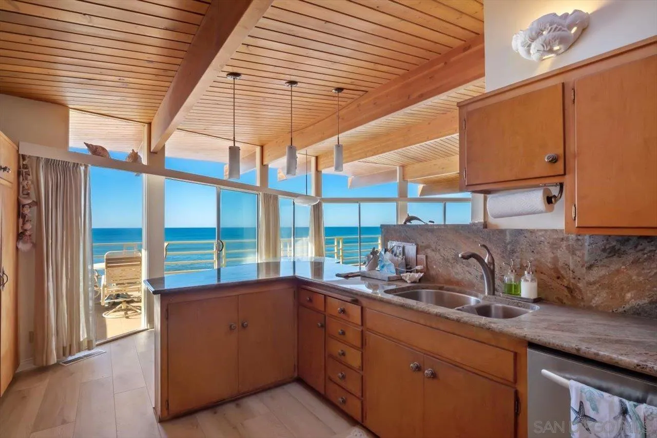 2681 Ocean Street Carlsbad, CA 92008 - Photo 5 of 36 a kitchen with sink and cabinets