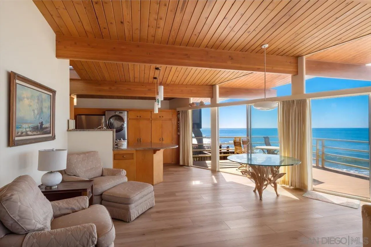 2681 Ocean Street Carlsbad, CA 92008 - Photo 6 of 36 a living room with furniture and wooden floor
