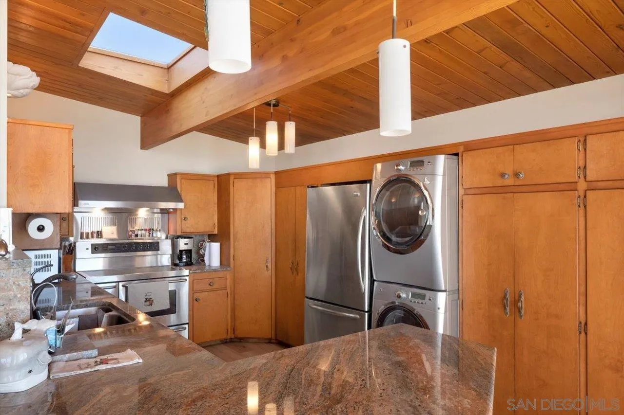 2681 Ocean Street Carlsbad, CA 92008 - Photo 7 of 36 a utility room with dryer and washer