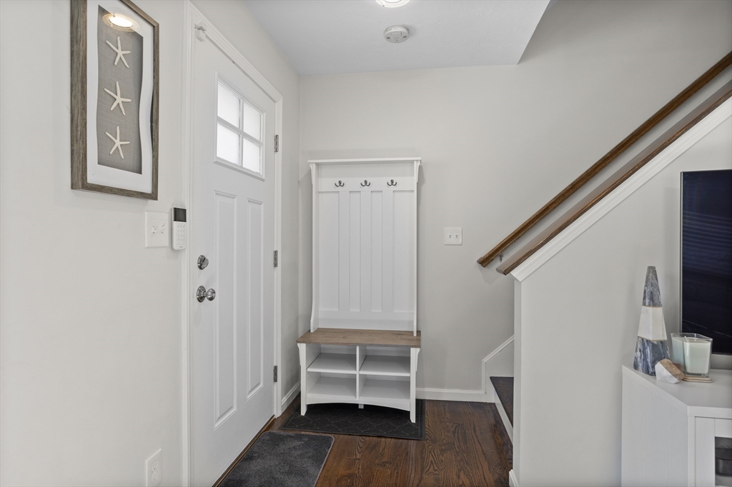 45 Riley Road, Unit 45 Tyngsborough, MA 01879 - Photo 16 of 42 a view of an entryway with wooden floor