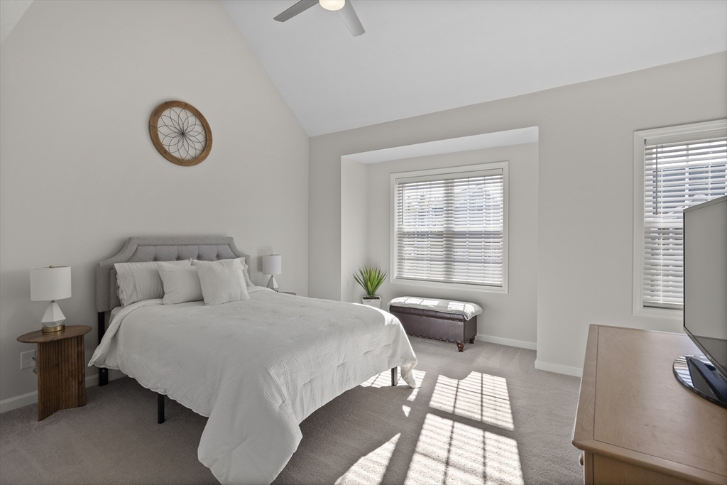 45 Riley Road, Unit 45 Tyngsborough, MA 01879 - Photo 22 of 42 a bedroom with a bed and a window