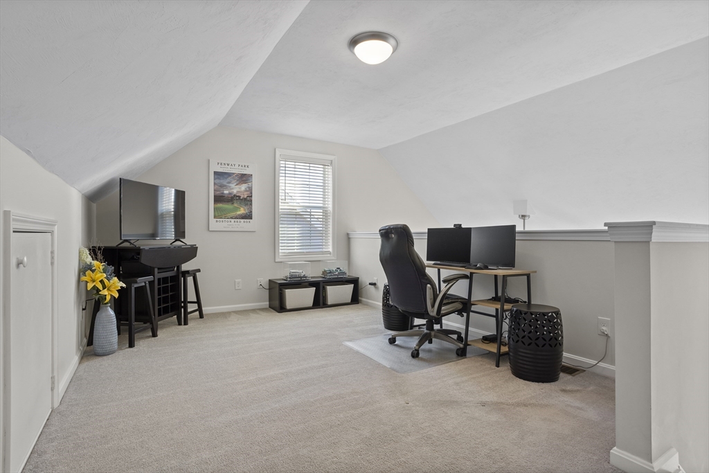 45 Riley Road, Unit 45 Tyngsborough, MA 01879 - Photo 28 of 42 a view of a livingroom with workspace and a window