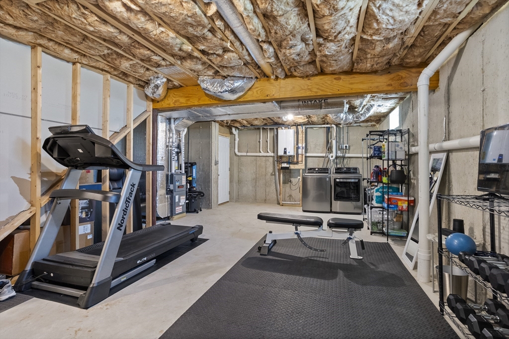 45 Riley Road, Unit 45 Tyngsborough, MA 01879 - Photo 30 of 42 a view of a room with gym equipment