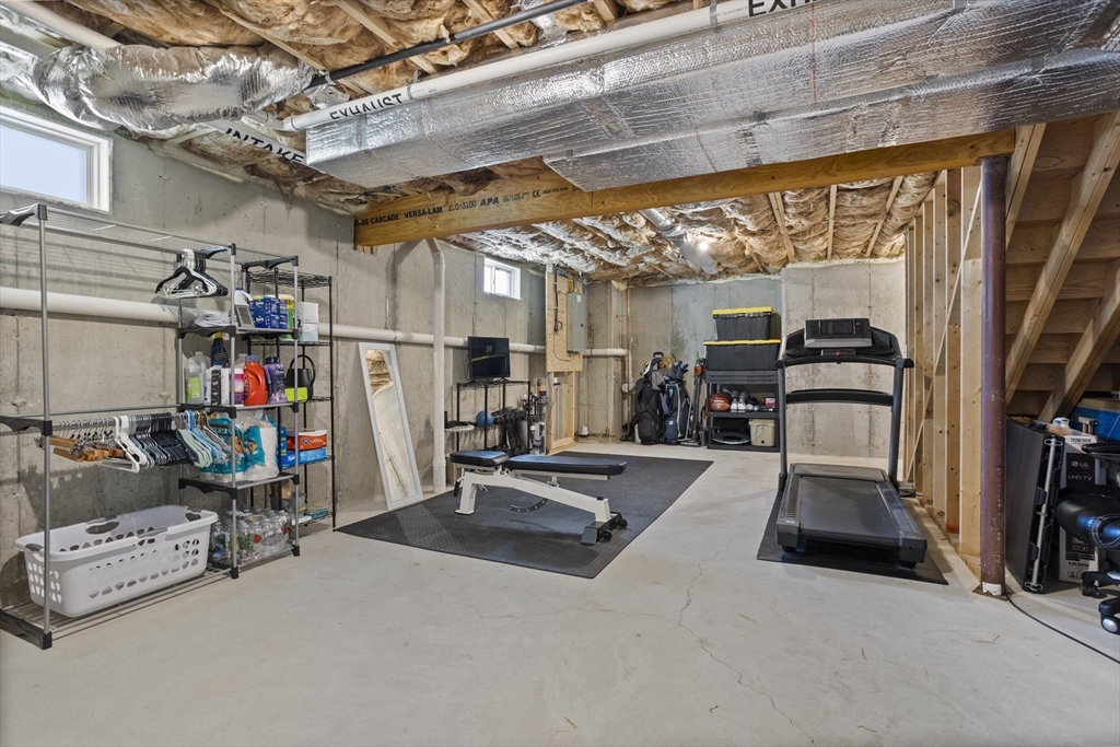 45 Riley Road, Unit 45 Tyngsborough, MA 01879 - Photo 31 of 42 a view of a gym with equipment