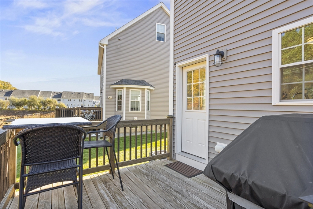 45 Riley Road, Unit 45 Tyngsborough, MA 01879 - Photo 33 of 42 a view of a two chairs on the roof deck