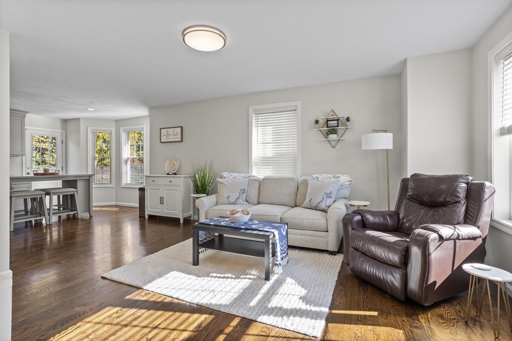 45 Riley Road, Unit 45 Tyngsborough, MA 01879 - Photo 5 of 42 a living room with furniture and wooden floor
