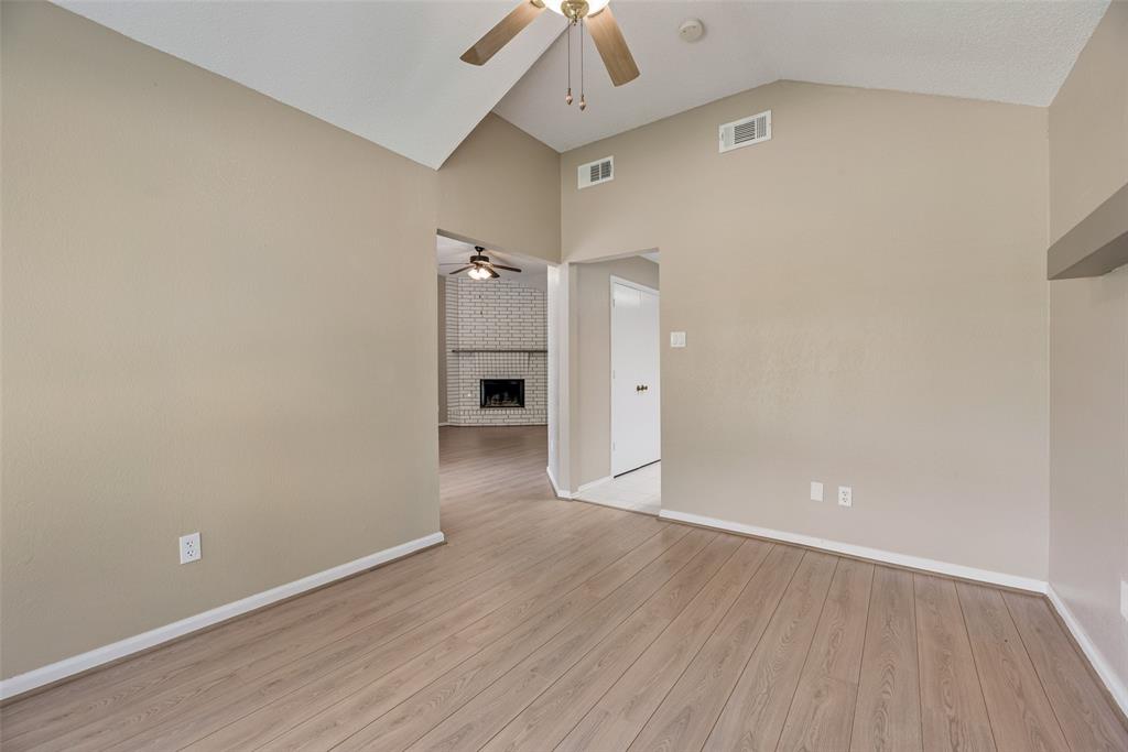 7805 Swiss Way Rowlett, TX 75089 - Photo 11 of 32 wooden floor in an empty room