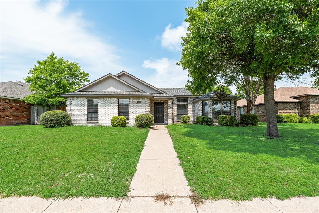7805 Swiss Way Rowlett, TX 75089 - Photo 2 of 32 a view of a yard in front of a house