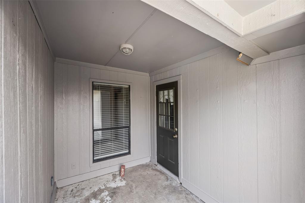 7805 Swiss Way Rowlett, TX 75089 - Photo 28 of 32 a view of a livingroom with an empty space and window