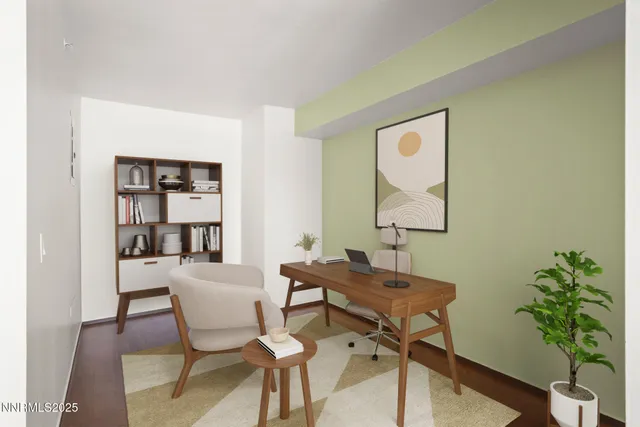 a view of a dining room with furniture and a potted plant