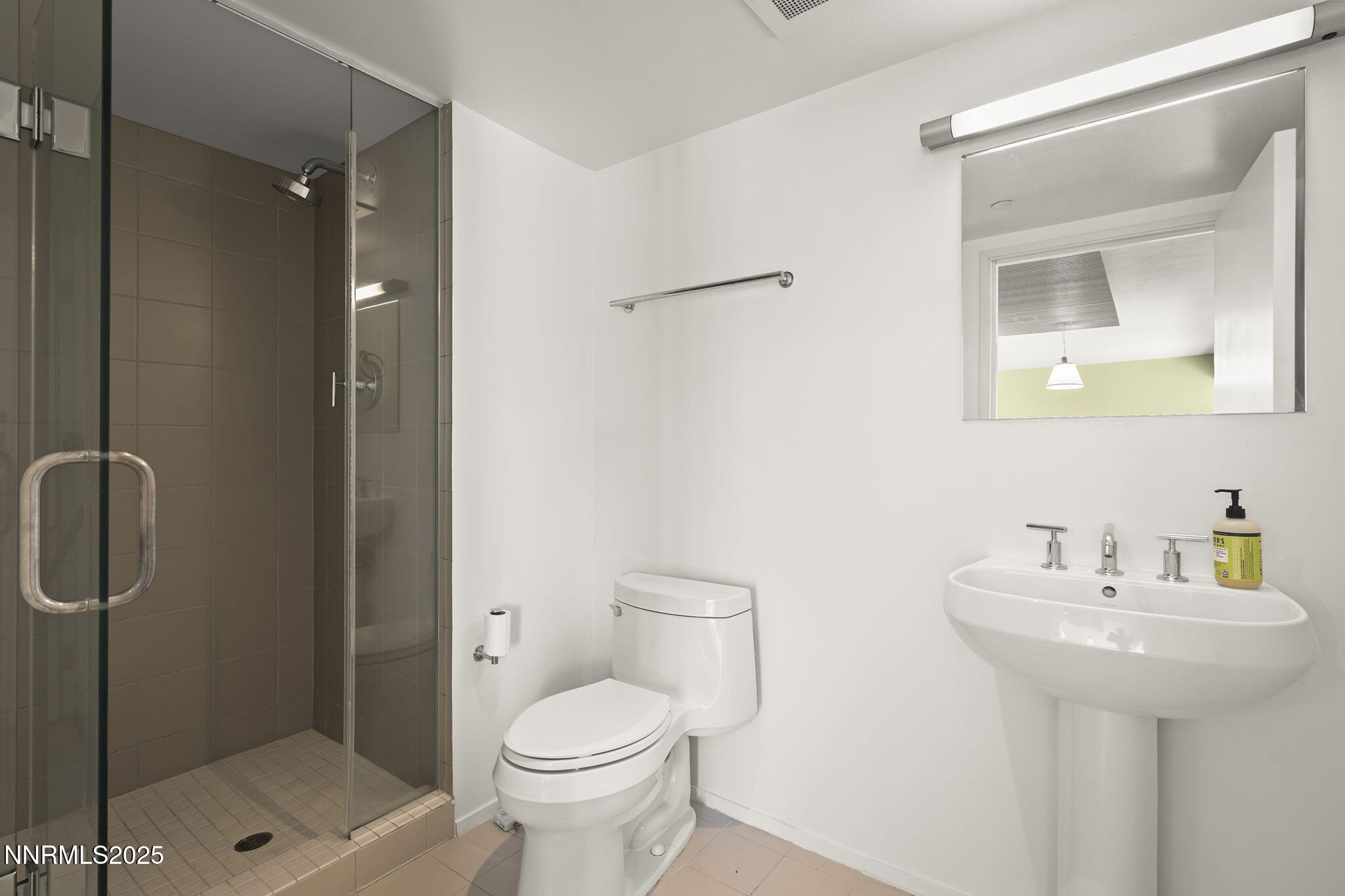 255 North Sierra Street, Unit 1419 Reno, NV 89501 - Photo 17 of 40 a bathroom with a sink toilet and shower