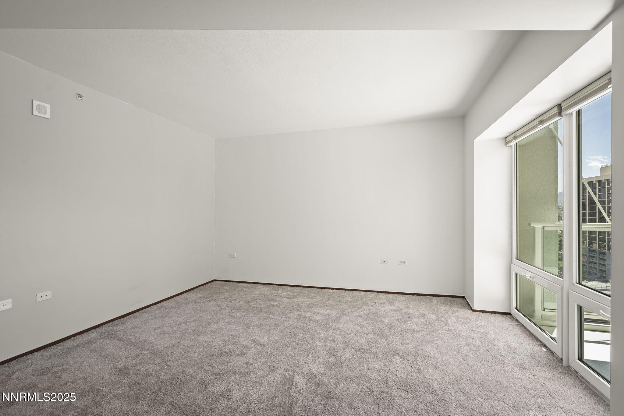 255 North Sierra Street, Unit 1419 Reno, NV 89501 - Photo 19 of 40 an empty room with windows