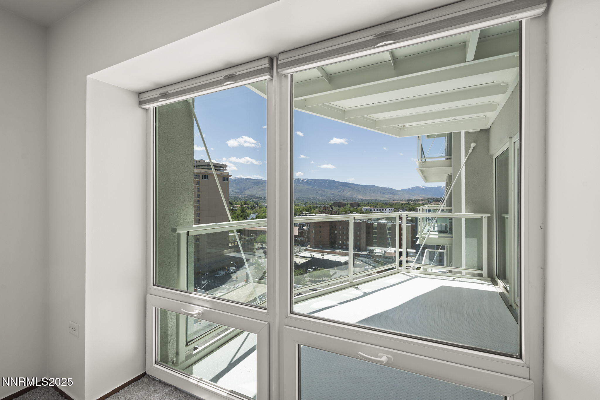 255 North Sierra Street, Unit 1419 Reno, NV 89501 - Photo 24 of 40 a view of a glass door with a glass door