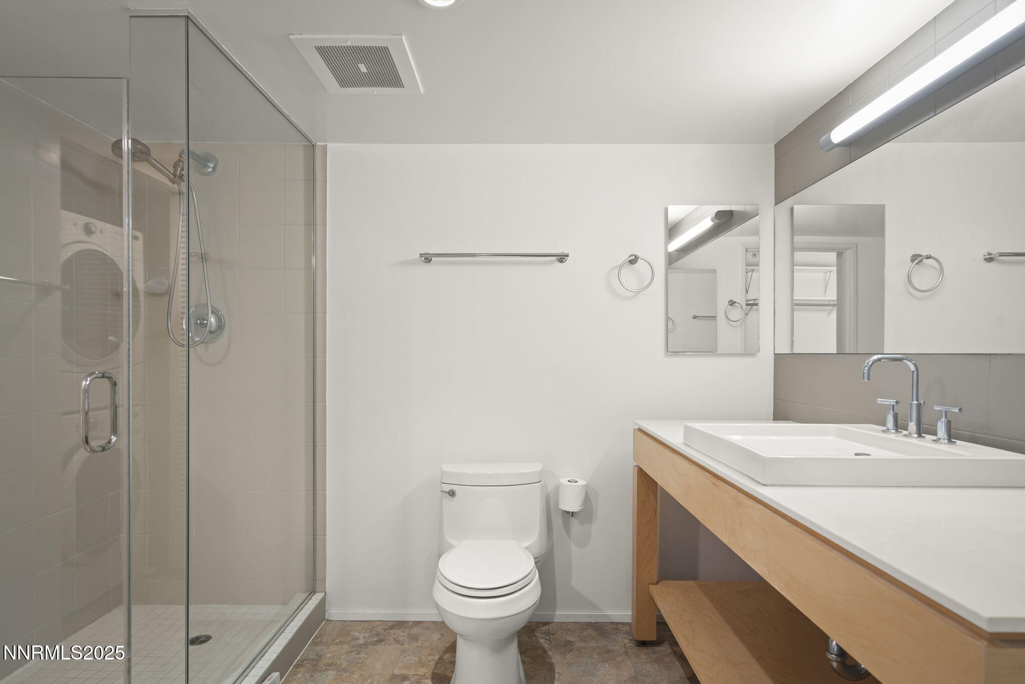 255 North Sierra Street, Unit 1419 Reno, NV 89501 - Photo 26 of 40 a bathroom with a sink toilet and shower