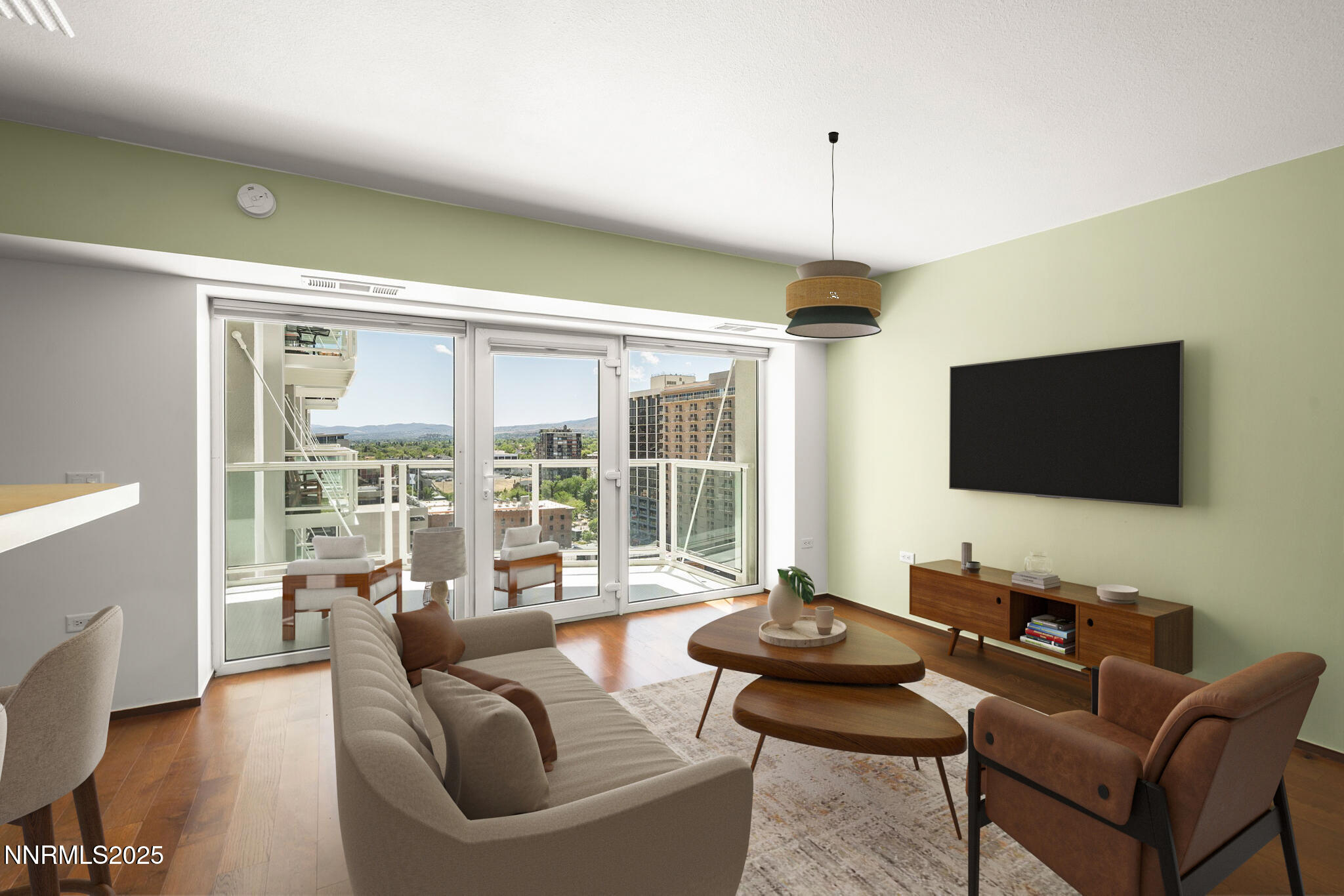 255 North Sierra Street, Unit 1419 Reno, NV 89501 - Photo 4 of 40 a living room with furniture and a flat screen tv