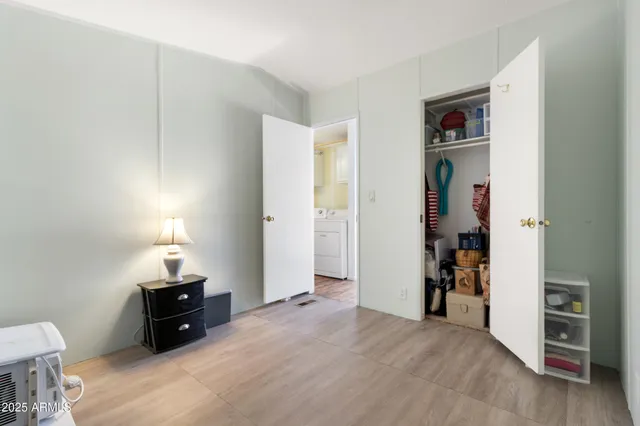 a bed room with a bed and a view