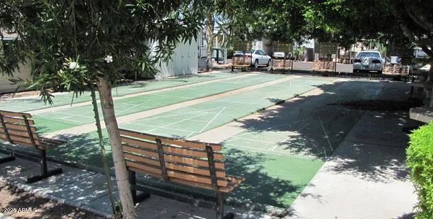 a view of a park with sitting area